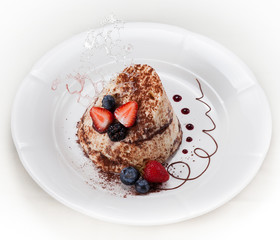 Tiramisu - Classical Dessert. Garnished with fruit