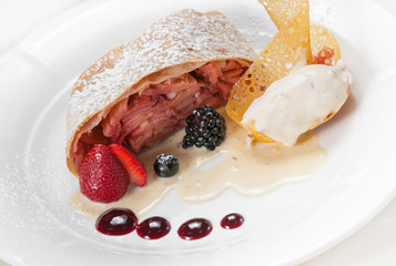Apple strudel with vanilla ice cream and fruit