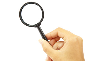 Hand holding magnifying glass on white  backckground