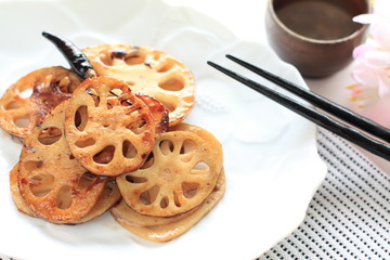 japanese cuisine, sliced lotus root on white dish