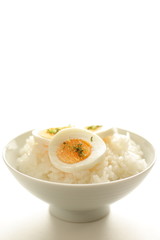 boiled egg sliced on rice for asian cuisine