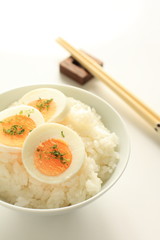 boiled egg sliced on rice for asian cuisine