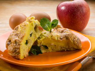 omelette with apple and mint leaf