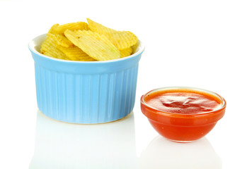Potato chips in bowl and sauce, isolated on white