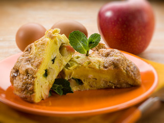 omelette with apple and mint leaf