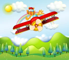 Rolgordijnen Een rood vliegtuig bestuurd door een tijger © GraphicsRF