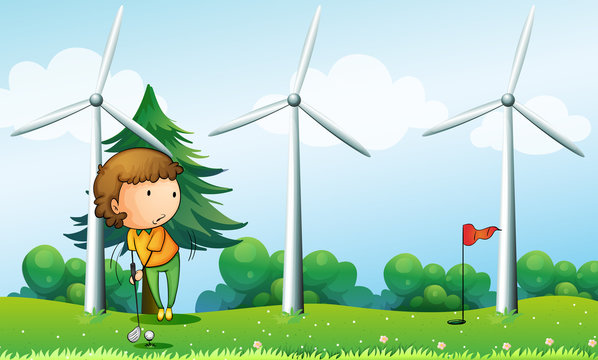 A girl playing golf near the windmills