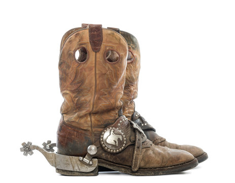 Side view of a pair of Cowboy boots with spurs