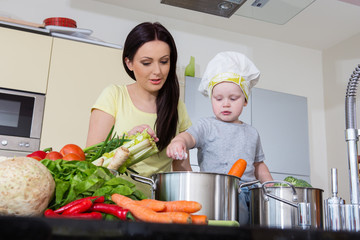 Mother and child at kitchen