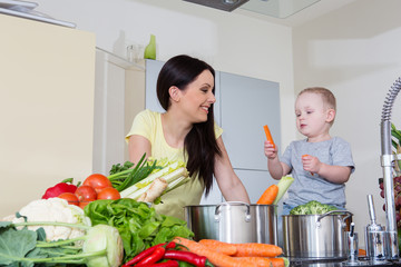 Mother and child at kitchen