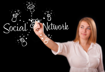 Woman draving social network theme on whiteboard