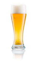 Glass of fresh beer with cap of foam isolated on white backgroun