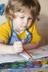 Little girl painting