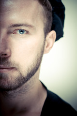 vintage half portrait of fashion guy with hat