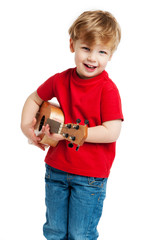 Cute Boy Playing Ukulele Guitar © slp_london