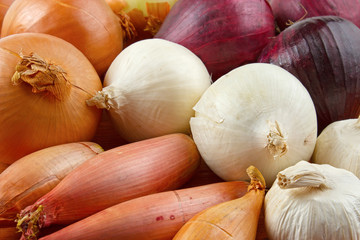 Different onion bulbs closeup , food background