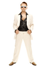 Mad disco dancer in white suit and snake leather boots