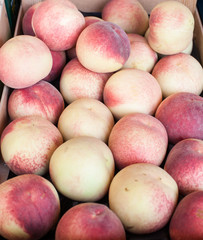 Fresh healthy peaches on  farmer market