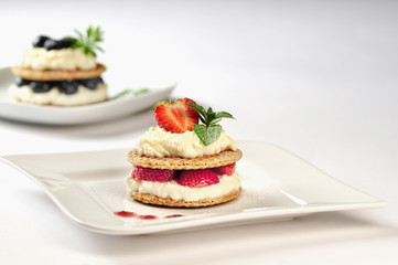 Sweet dessert - wafers with vanilla creme and strawberries