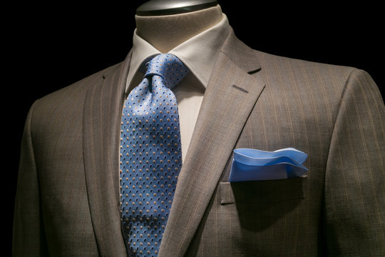 Tan Striped Jacket, Textured White Shirt, Patterned Blue Tie & H