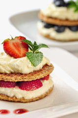 Sweet dessert - wafers with vanilla creme and strawberries