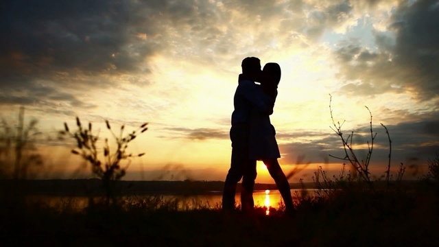 loving couple at sunset