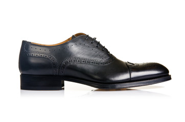 Fashion concept with male shoes on white