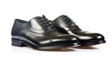 Fashion concept with male shoes on white