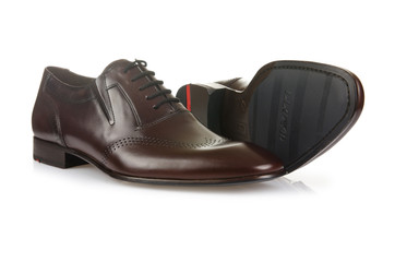 Fashion concept with male shoes on white