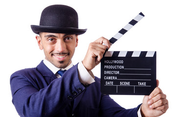 Man with movie clapper isolated on white