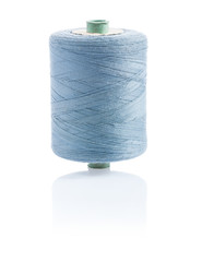 a bobbin with gray sewing string