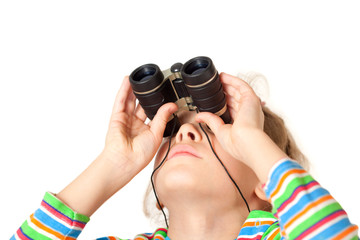 A girl looking up through a small binocular isolated