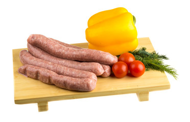 raw sausages and ingredients