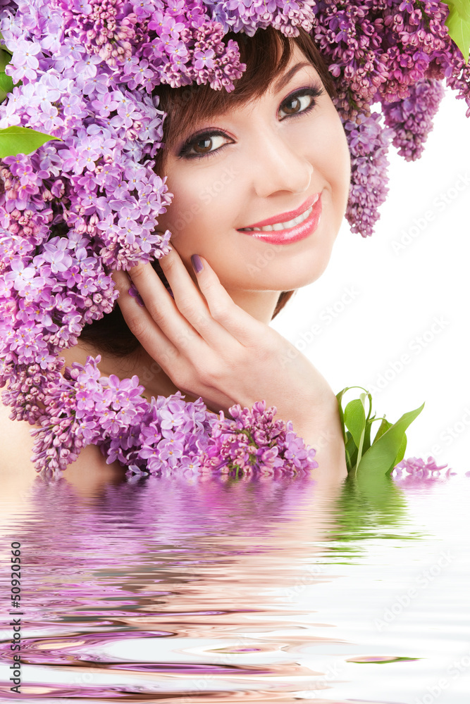 Canvas Prints Young woman with lilac flowers