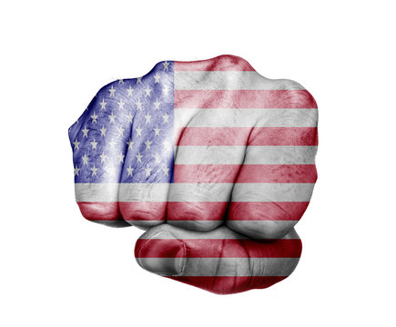 Conceptual image of a punching fist covered with the US flag