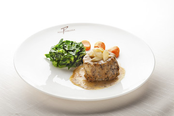 Juicy Fillet Mignon served with Sauce and Vegetables