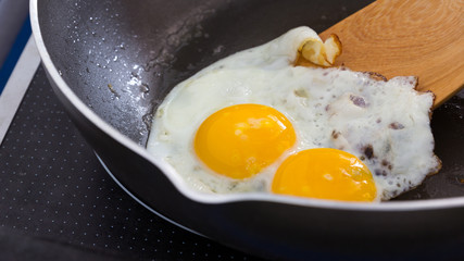Fried egg on a pan at The kitchen