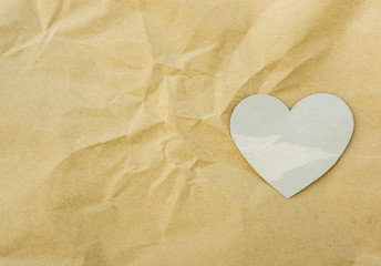 Heart paper  on brown paper texture