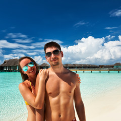 Obraz premium Couple on a beach at Maldives