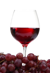 glass of wine and grapes, isolated on white
