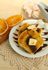 White bread toast with chocolate on wooden table