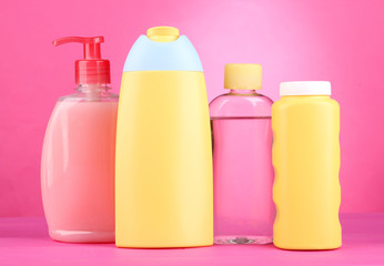 Baby cosmetics on pink background