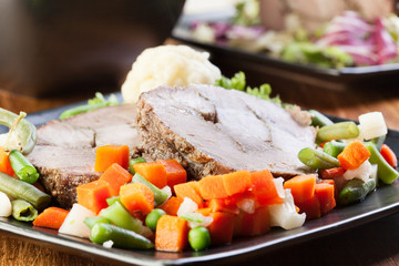Pork roast with vegetable. Selective focus.