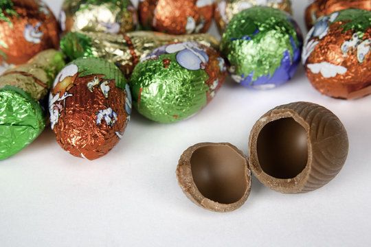 Easter chocolate eggs, with cracked one in first term
