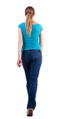 Obraz premium back view of walking woman