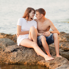 Fototapeta na wymiar Attractive couple at the sea