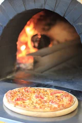 pizza in a wooden oven