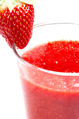 Fresh made strawberry jam in glass with fresh strawberry close u