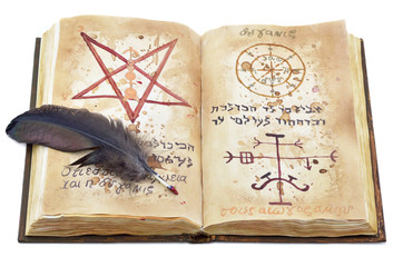 Magic book with feather isolated