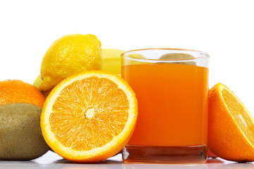 glass of juice and fresh fruits